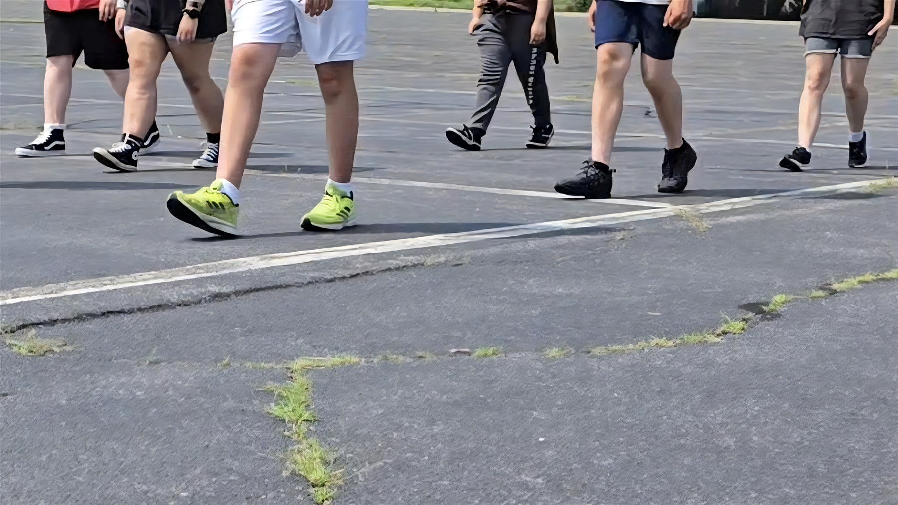 High School Band practicing correct marching technique.